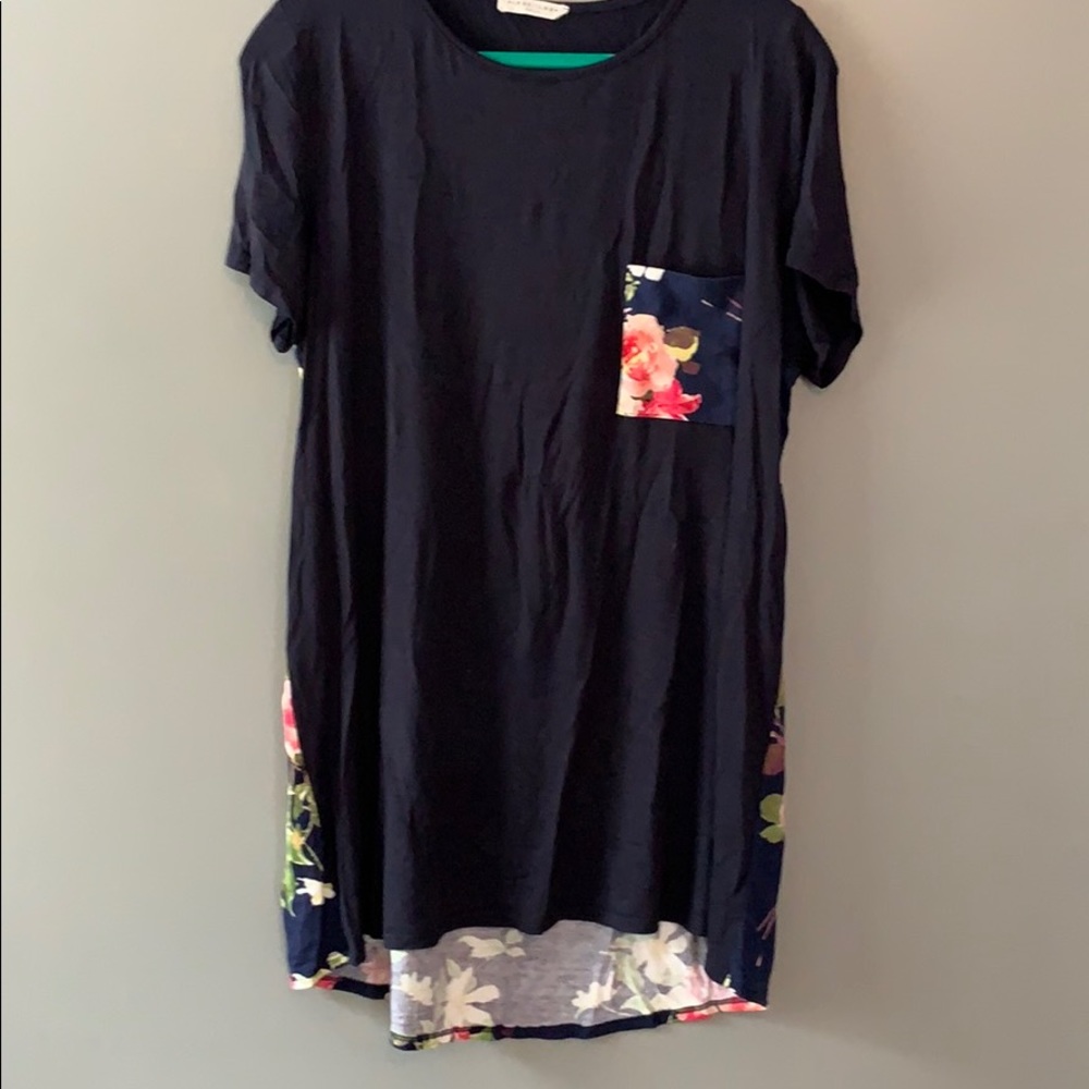 Navy with floral back short sleeved shirt.